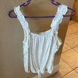 White and black polka dot tank top with tie at the waist. Brand new with tags